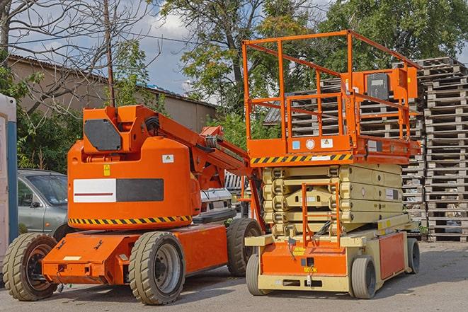 forklift moving inventory in warehouse setting in Whittier